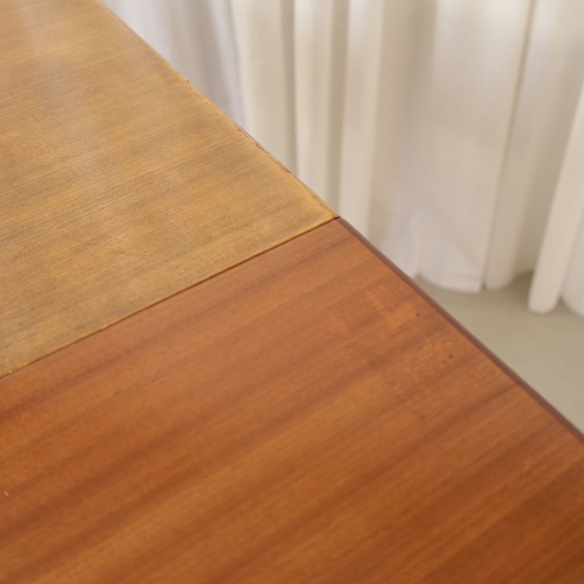 Alvar Aalto extendable teak table with figured birch legs — tabletop, extension leaf or frame detail