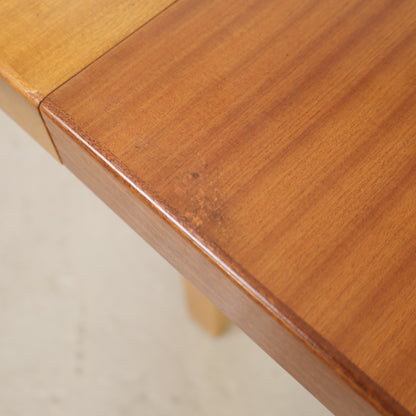 Alvar Aalto extendable teak table with figured birch legs — tabletop, extension leaf or frame detail