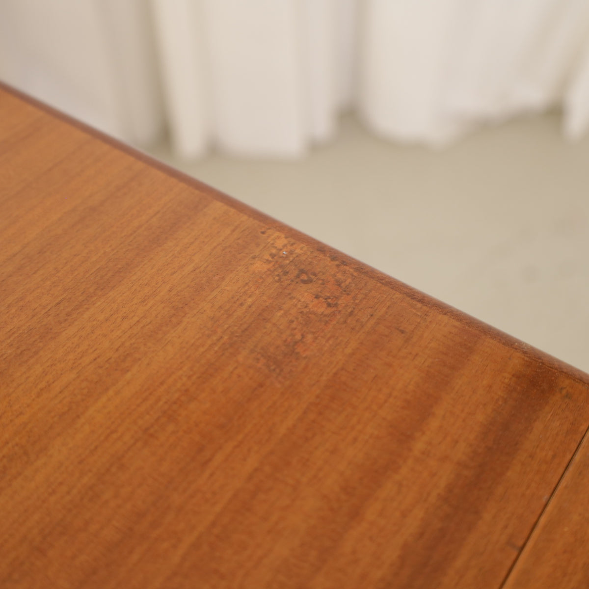 Alvar Aalto extendable teak table with figured birch legs — tabletop, extension leaf or frame detail