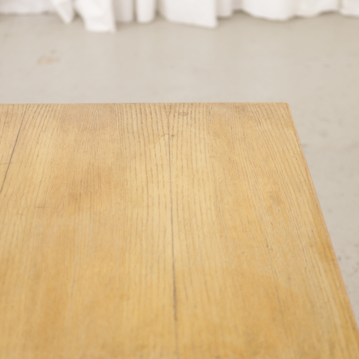 Alvar Aalto nesting tables for Artek, patinated wooden surfaces and bent legs — surface and edge wear detail