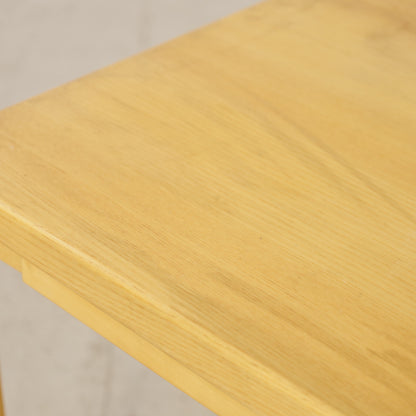 Alvar Aalto nesting tables for Artek, patinated wooden surfaces and bent legs — surface and edge wear detail
