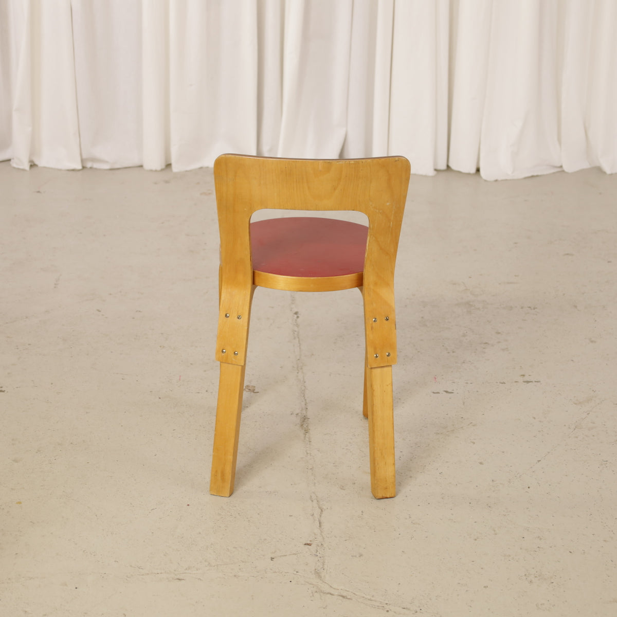 Alvar Aalto Chair 65 in Birch and Red Linoleum for Artek, front view of vintage Artek Chair 65