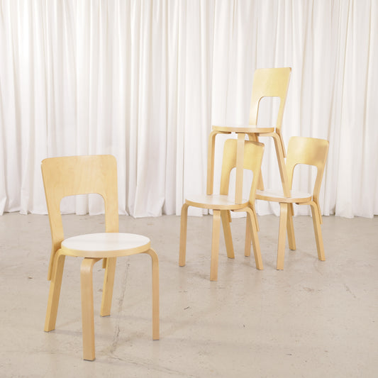 Alvar Aalto Chair 66 with White Laminate Seat for Artek, Four Available, four Artek Chair 66 chairs in birch and white laminate, group view