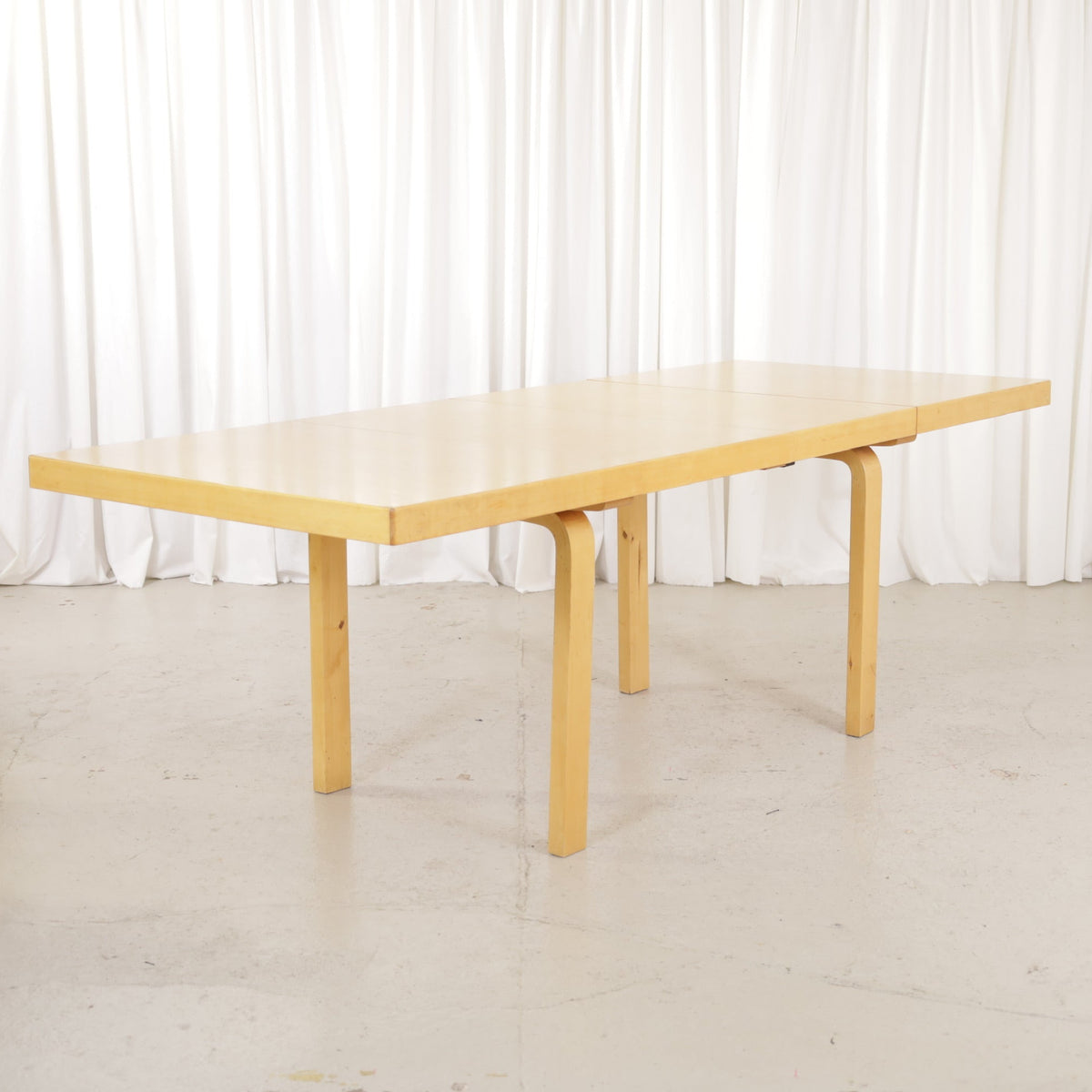 Alvar Aalto Model 92 extendable dining table by Artek, fully extended