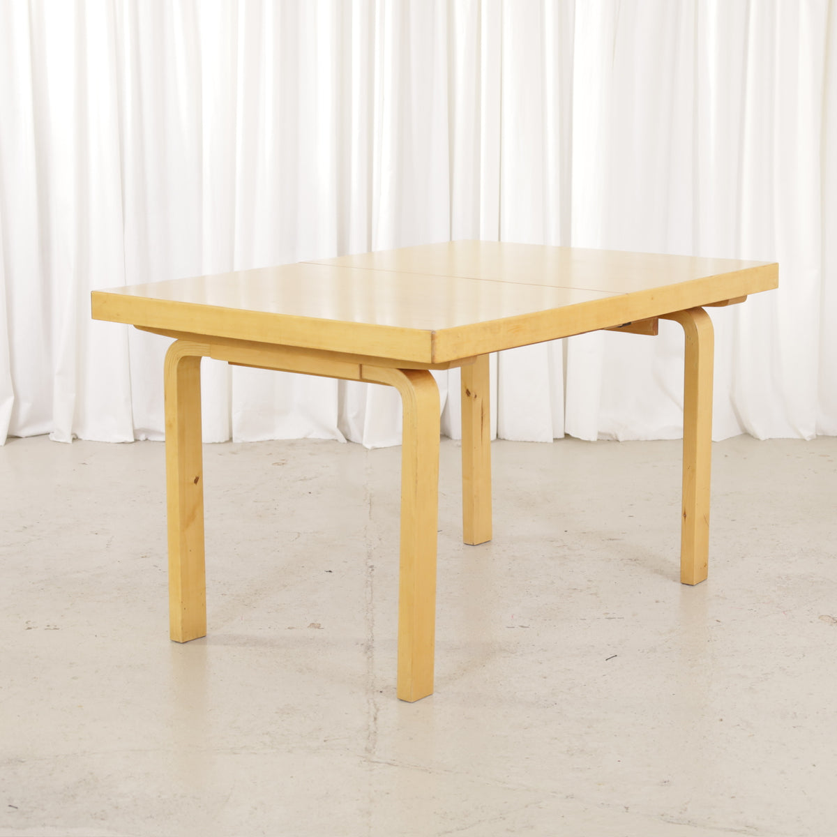 Alvar Aalto Model 92 extendable dining table by Artek, closed position