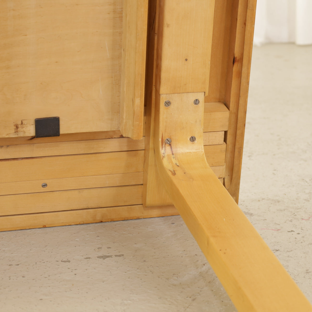Alvar Aalto Model 92 Extendable Dining Table by Artek, bent birch leg and underside detail of Alvar Aalto Model 92 table by Artek