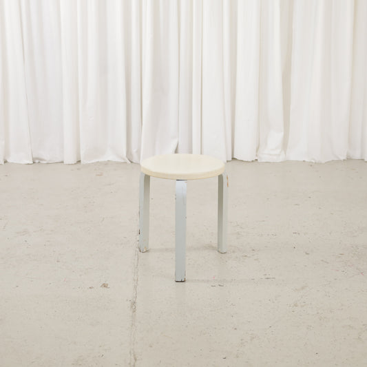 Alvar Aalto Stool 60 for Artek with Light Upholstered Seat, repainted Artek Stool 60 with a light upholstered seat, front view
