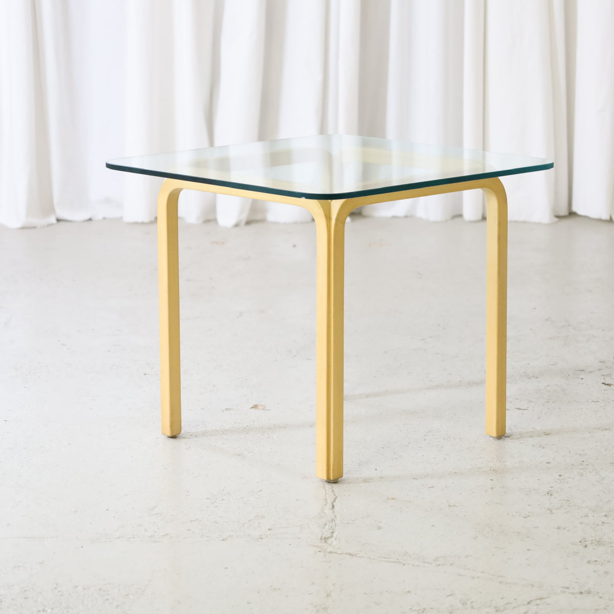 Alvar Aalto Y805C Glass Side Table for Artek, artek Y805C glass coffee table viewed at an angle
