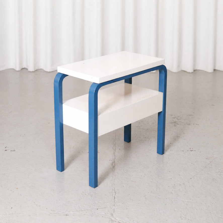 Artek side table viewed from the rear angle