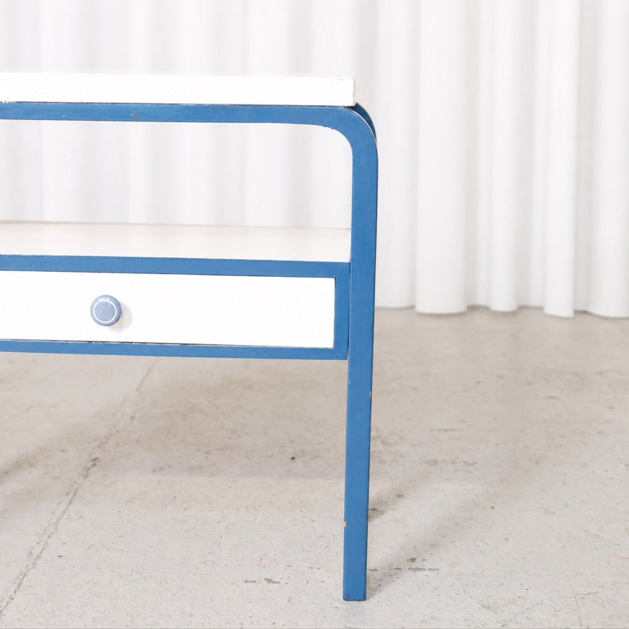 Detail of the drawer and blue bentwood frame