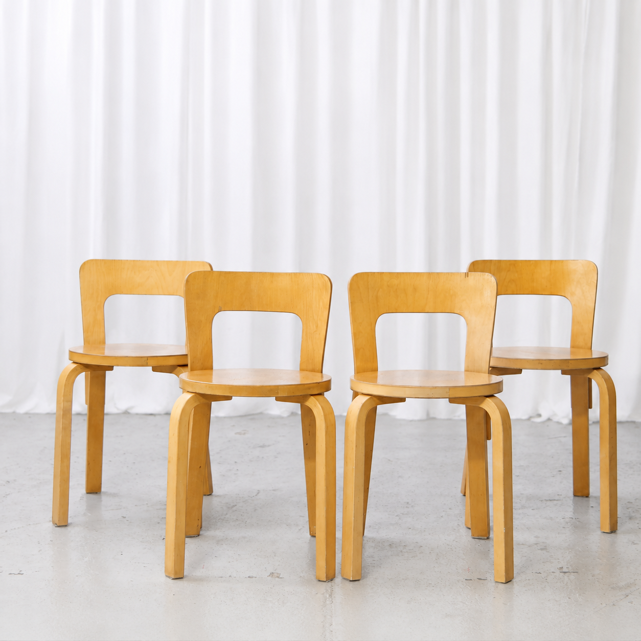 Set of four vintage Artek 65 birch chairs by Alvar Aalto from the 1950s