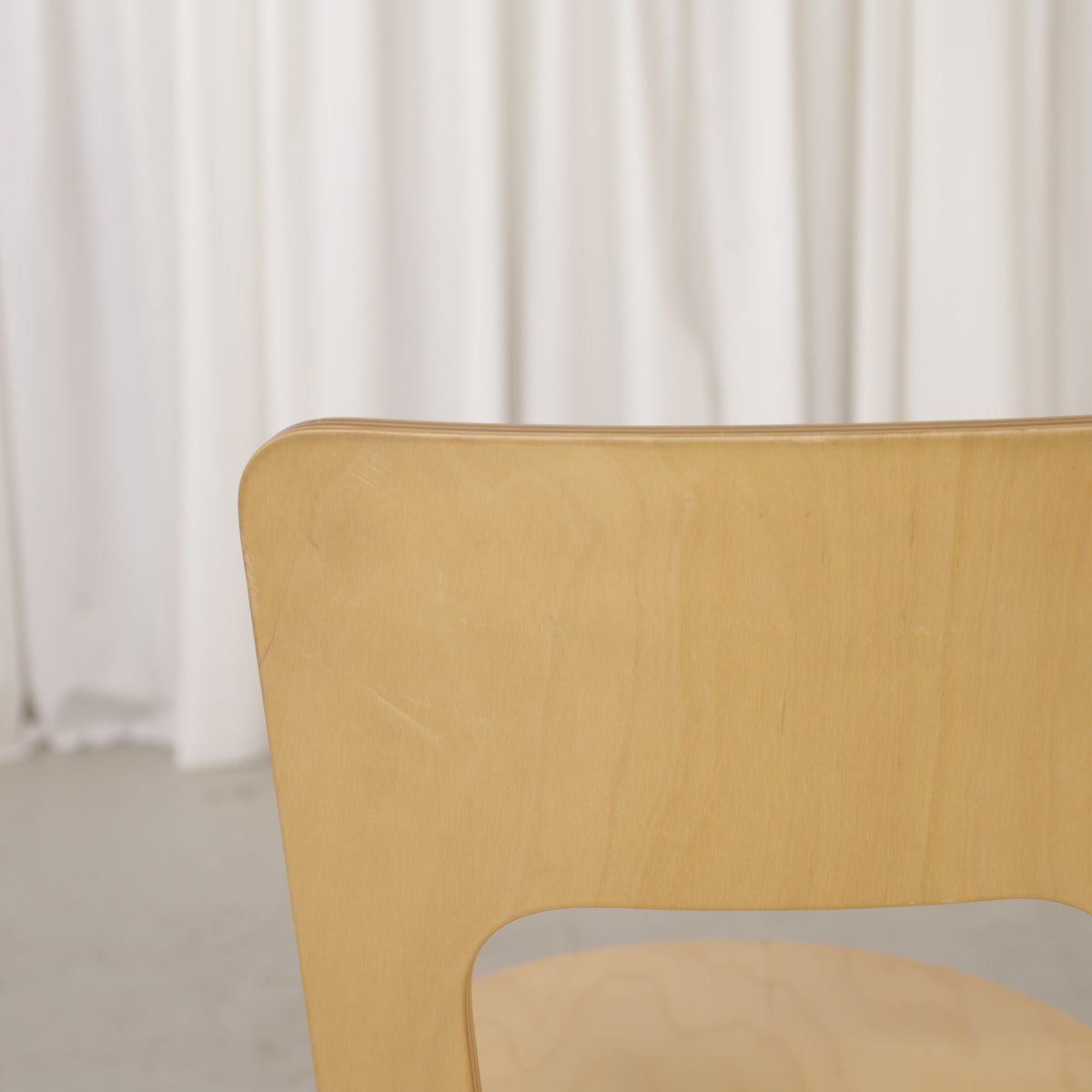 Alvar Aalto Chair 66 for Artek in birch, wooden surface and wear detail
