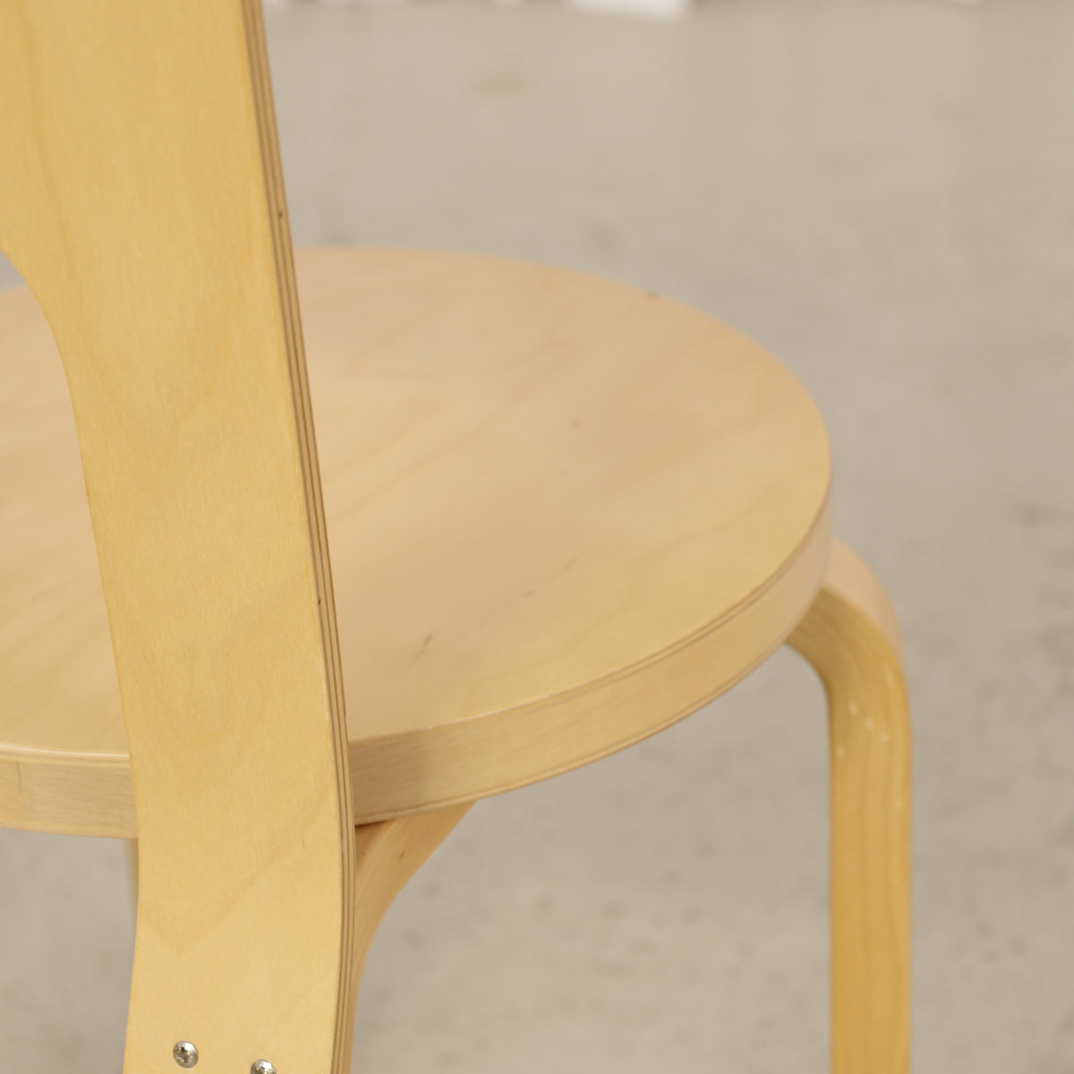 Alvar Aalto Chair 66 for Artek in birch, wooden surface and wear detail