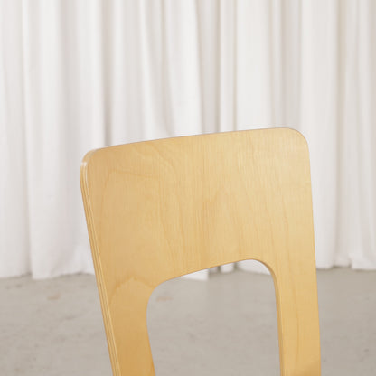 Alvar Aalto Chair 66 for Artek in patinated birch, wooden seat, backrest and frame detail
