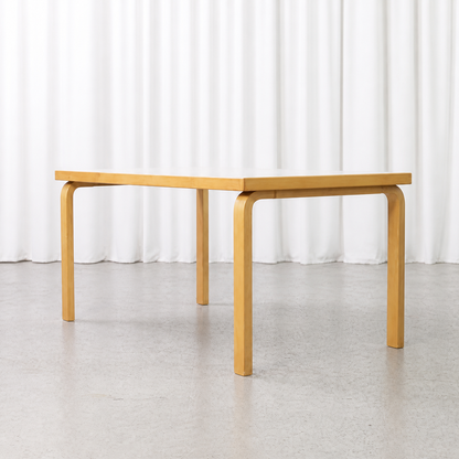 Artek 82A rectangular dining table in birch and white laminate