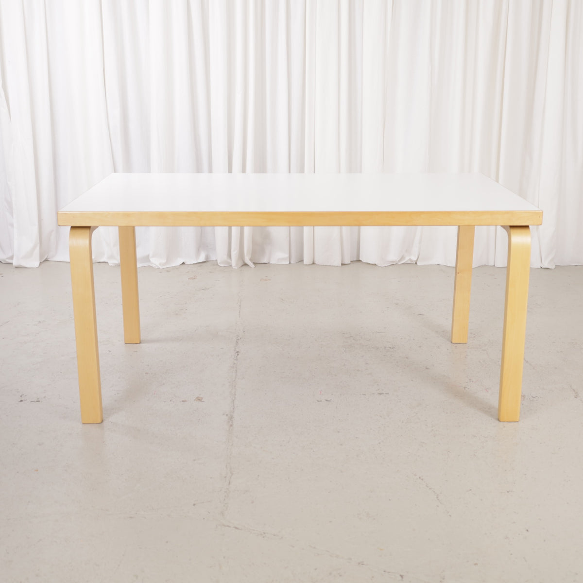 Alvar Aalto 82A table for Artek with white top and birch legs — full table view