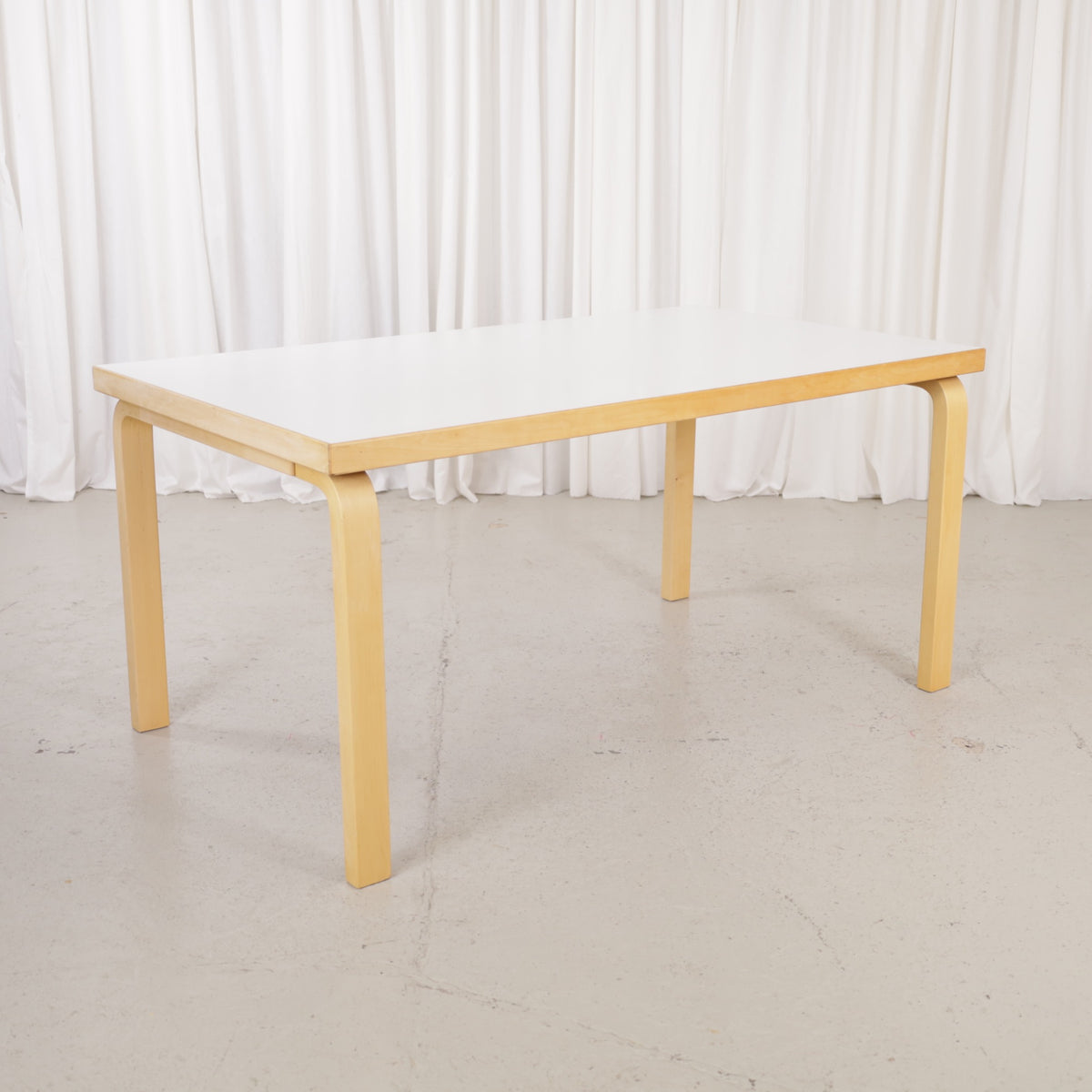 Alvar Aalto 82A table for Artek with white top and birch legs — full table view