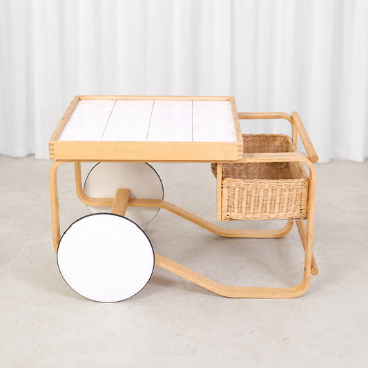 Side view of Artek Tea Trolley 900 with large white wheels
