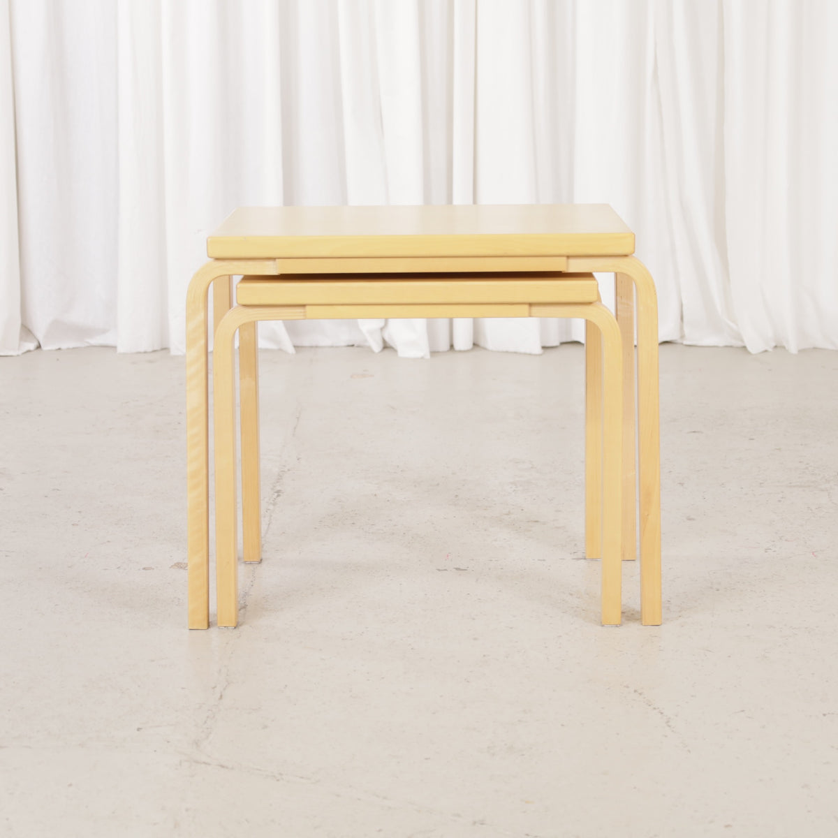 Alvar Aalto birch nesting tables for Artek — view of the table set