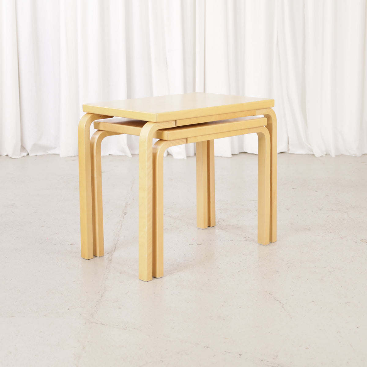 Alvar Aalto birch nesting tables for Artek — view of the table set