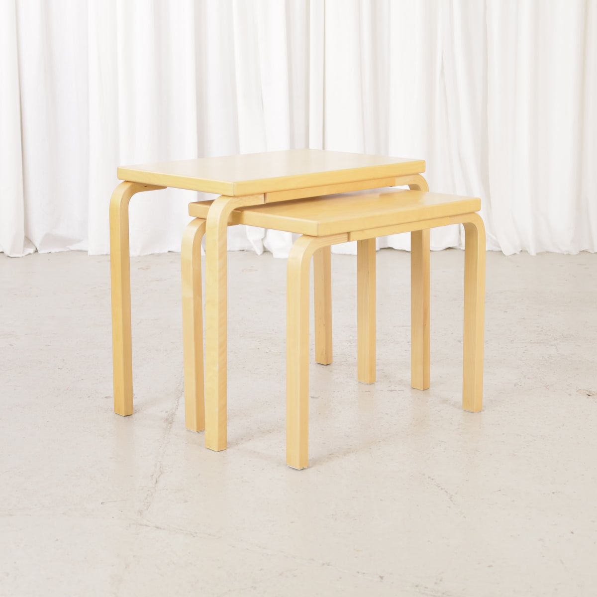 Alvar Aalto birch nesting tables for Artek — view of the table set