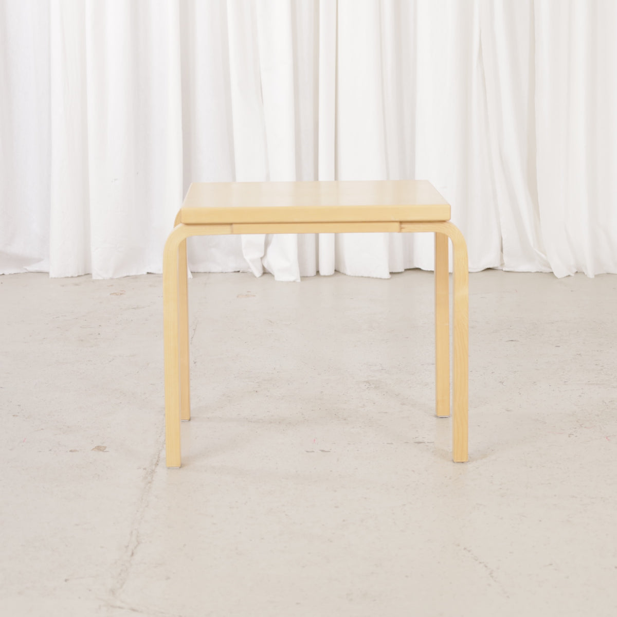 Alvar Aalto birch nesting tables for Artek — view of the table set