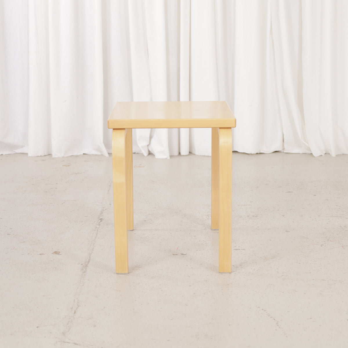 Alvar Aalto birch nesting tables for Artek — view of the table set