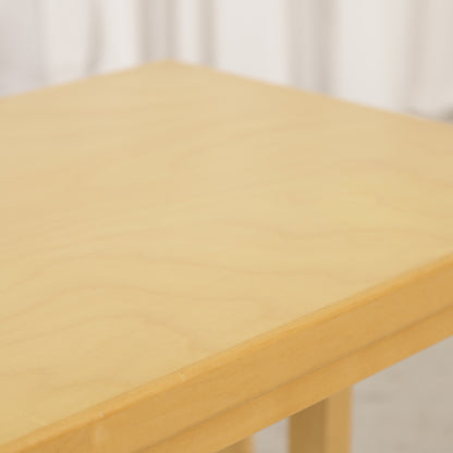 Alvar Aalto birch nesting tables for Artek — tabletop and bent leg detail