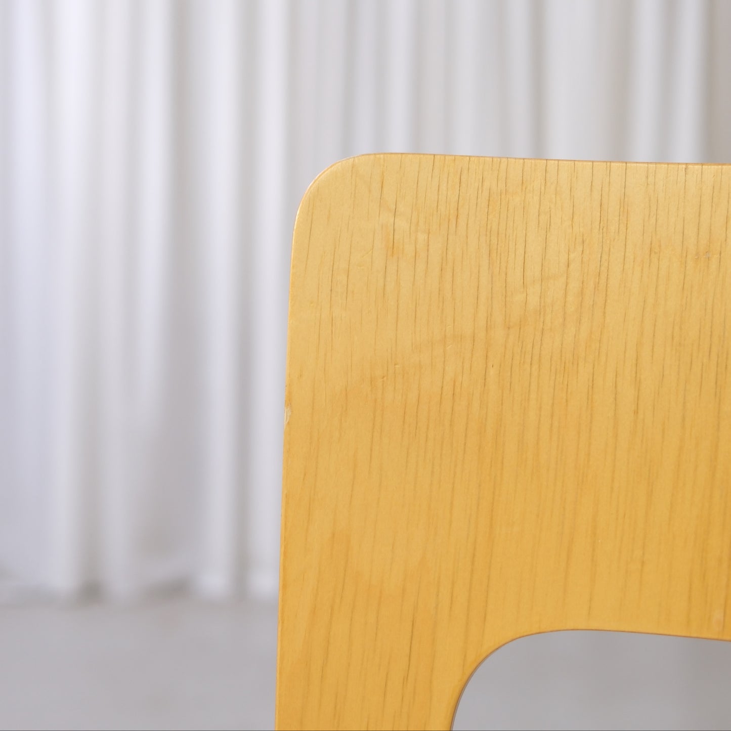 Close-up of patina and wear on the birch backrest