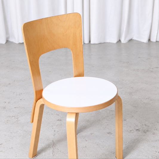 Artek Chair 66 in birch with white laminate seat, front view