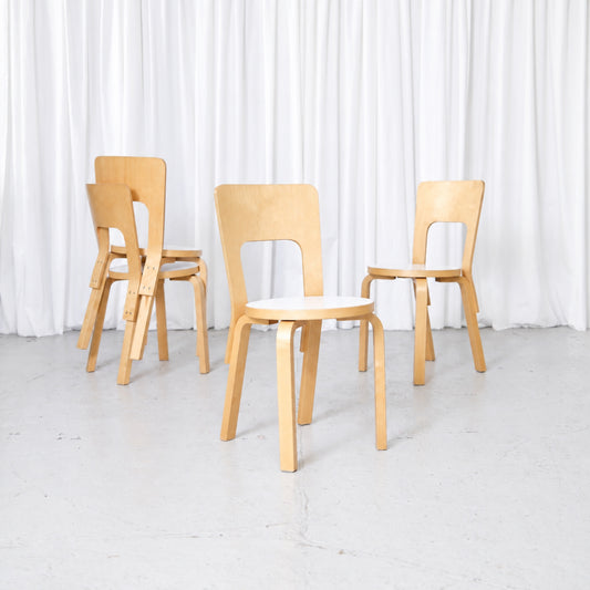 Set of four Artek Chair 66 chairs in birch with white laminate seats