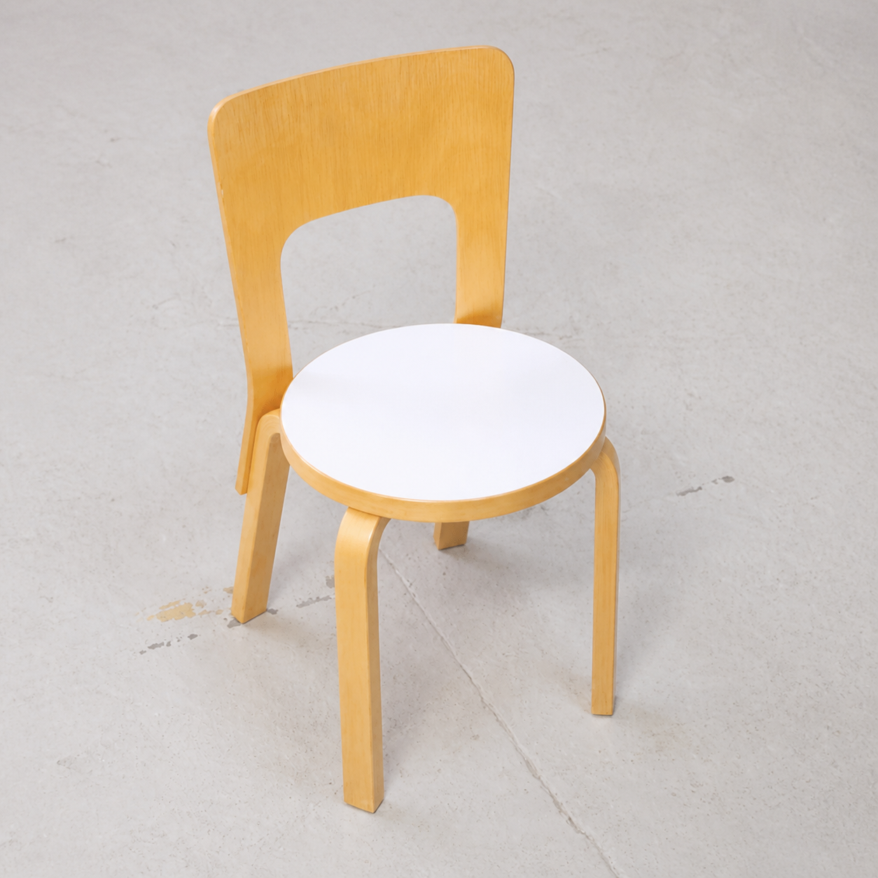 Top view of Artek Chair 66 showing the white laminate seat