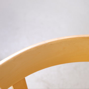 Detail of light wear on the birch backrest of Chair 69