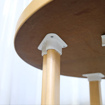 Underside detail of an Artek H99 table showing an HL2 leg mount