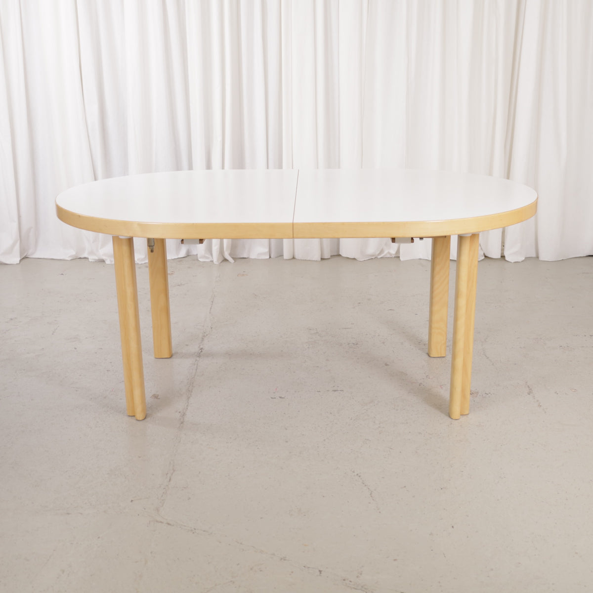 Artek H99 extendable table in white laminate and birch — full table view