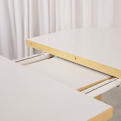 Artek H99 table opened to insert the extension leaf