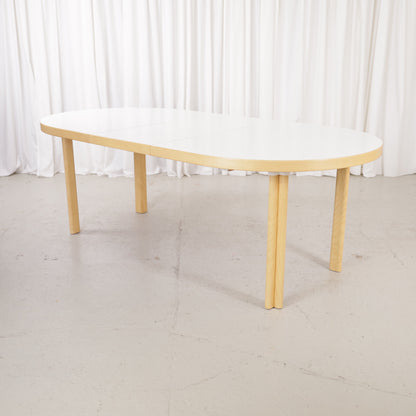 Artek H99 extendable table in white laminate and birch — full table view