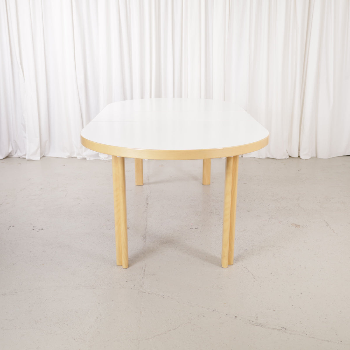 Artek H99 extendable table in white laminate and birch — full table view