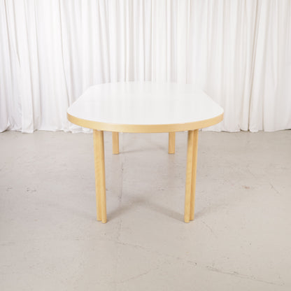 Artek H99 extendable table in white laminate and birch — full table view