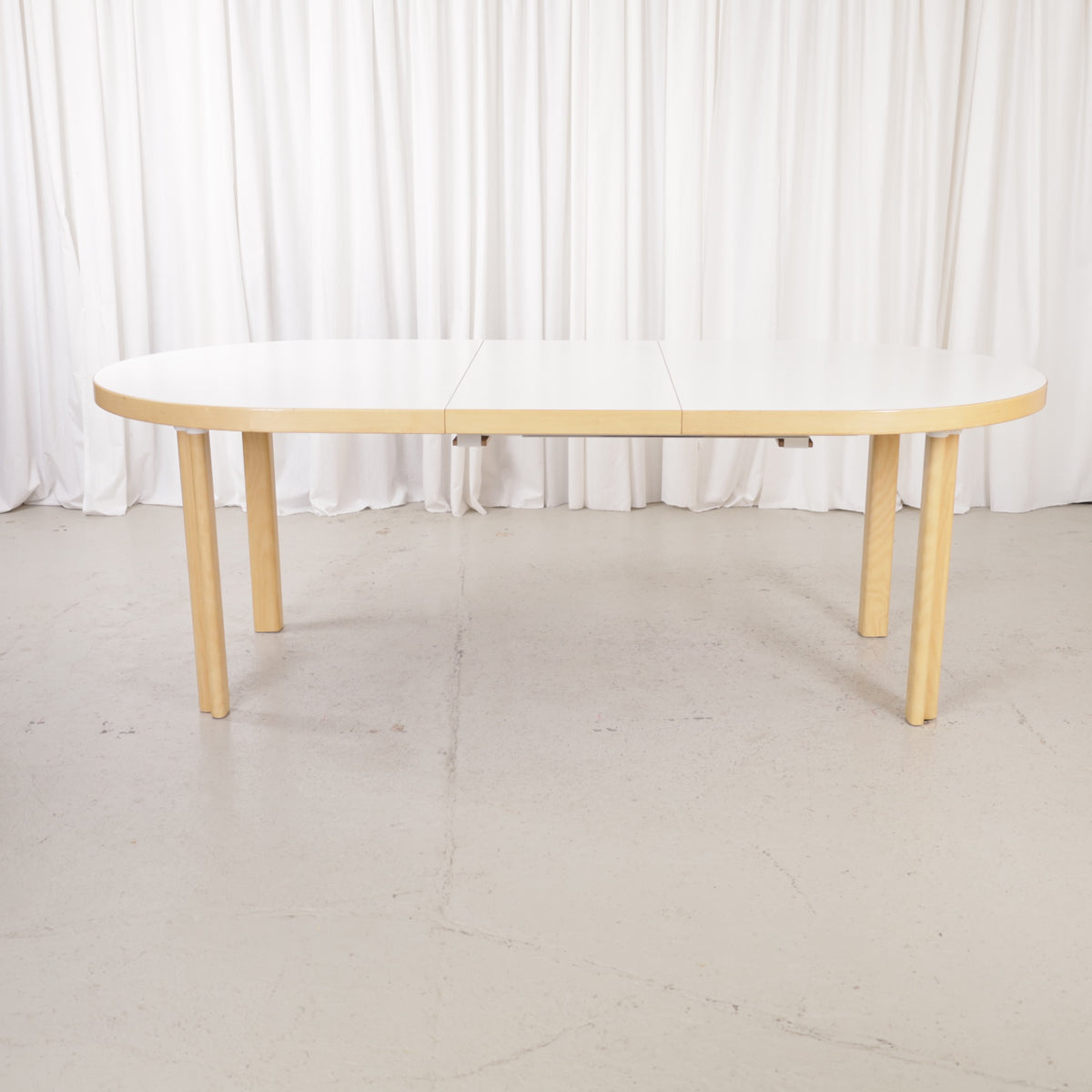 Artek H99 extendable table in white laminate and birch — full table view