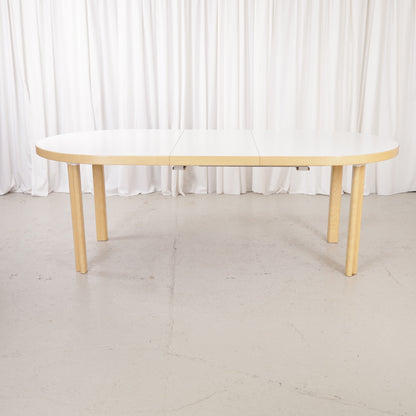 Artek H99 extendable table in white laminate and birch — full table view