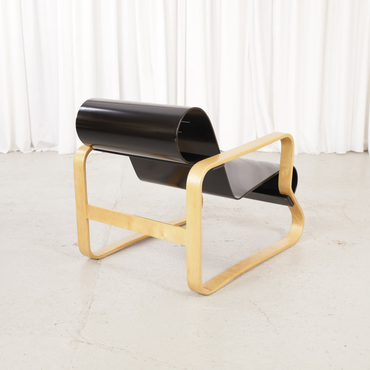 Alvar Aalto Paimio 41 lounge chair — rear three-quarter view