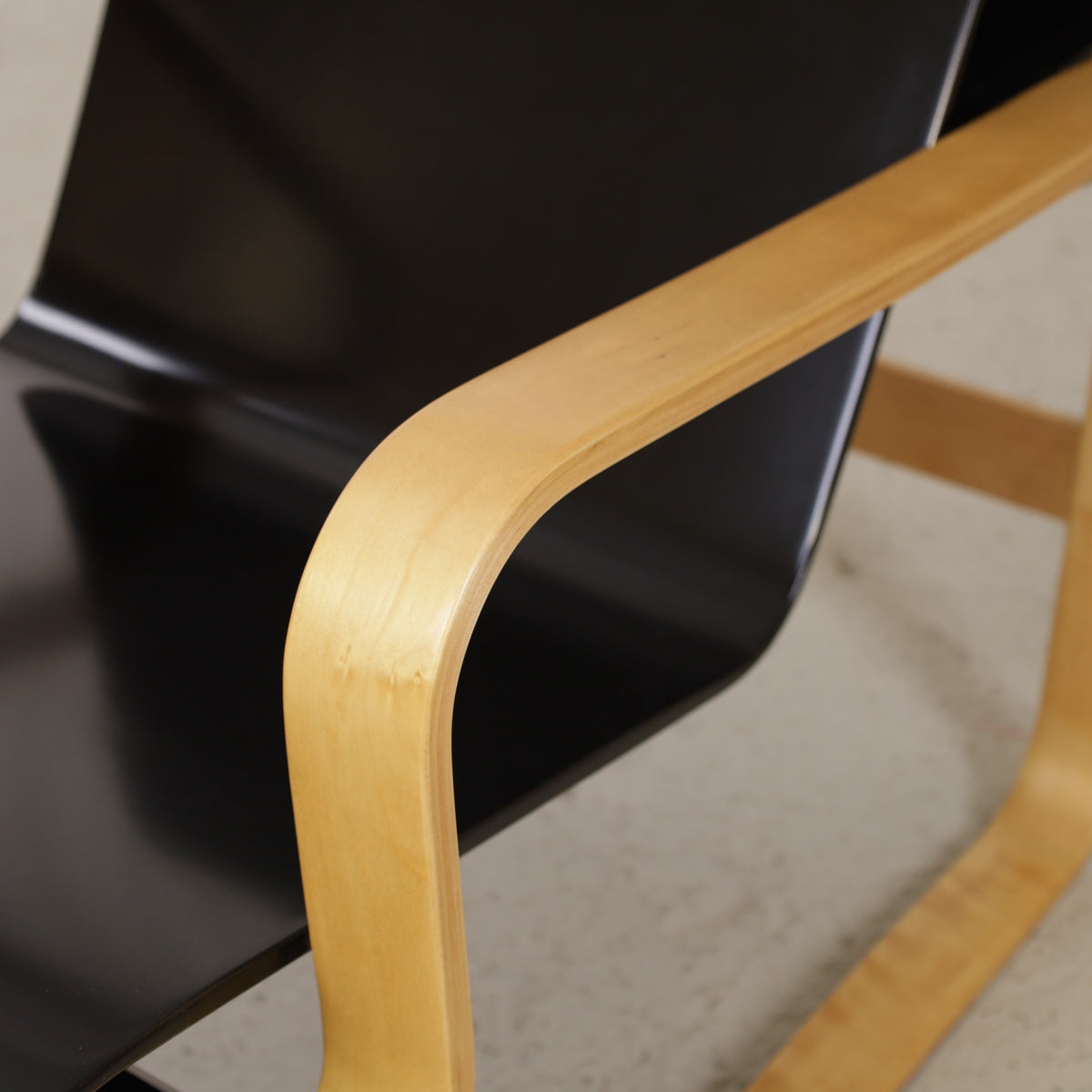 Alvar Aalto Paimio 41 lounge chair — birch armrest and frame detail