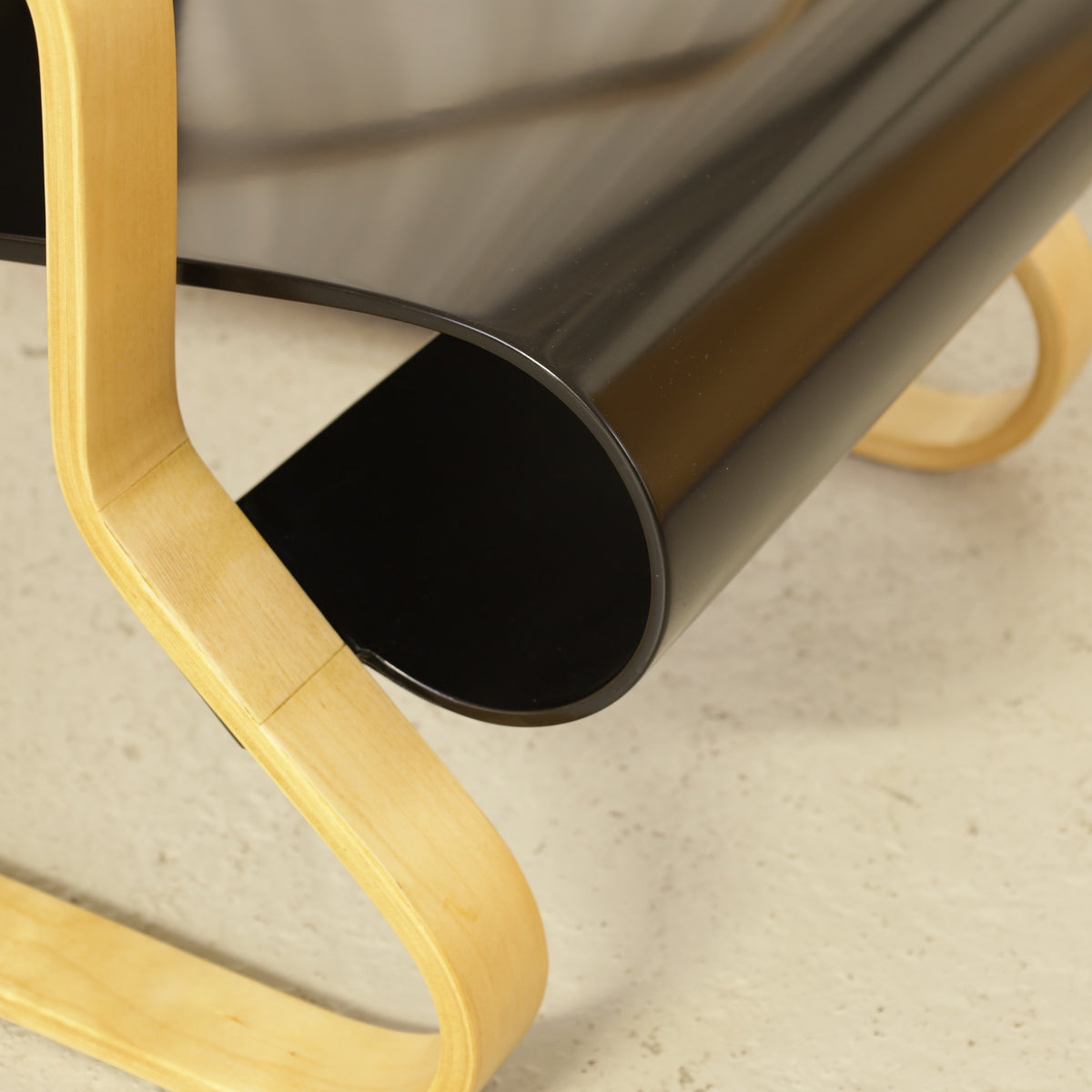 Alvar Aalto Paimio 41 lounge chair — rolled plywood seat edge and birch leg