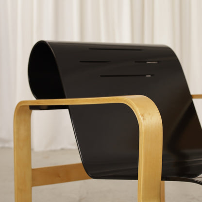 Alvar Aalto Paimio 41 lounge chair — curved black plywood back and birch armrest