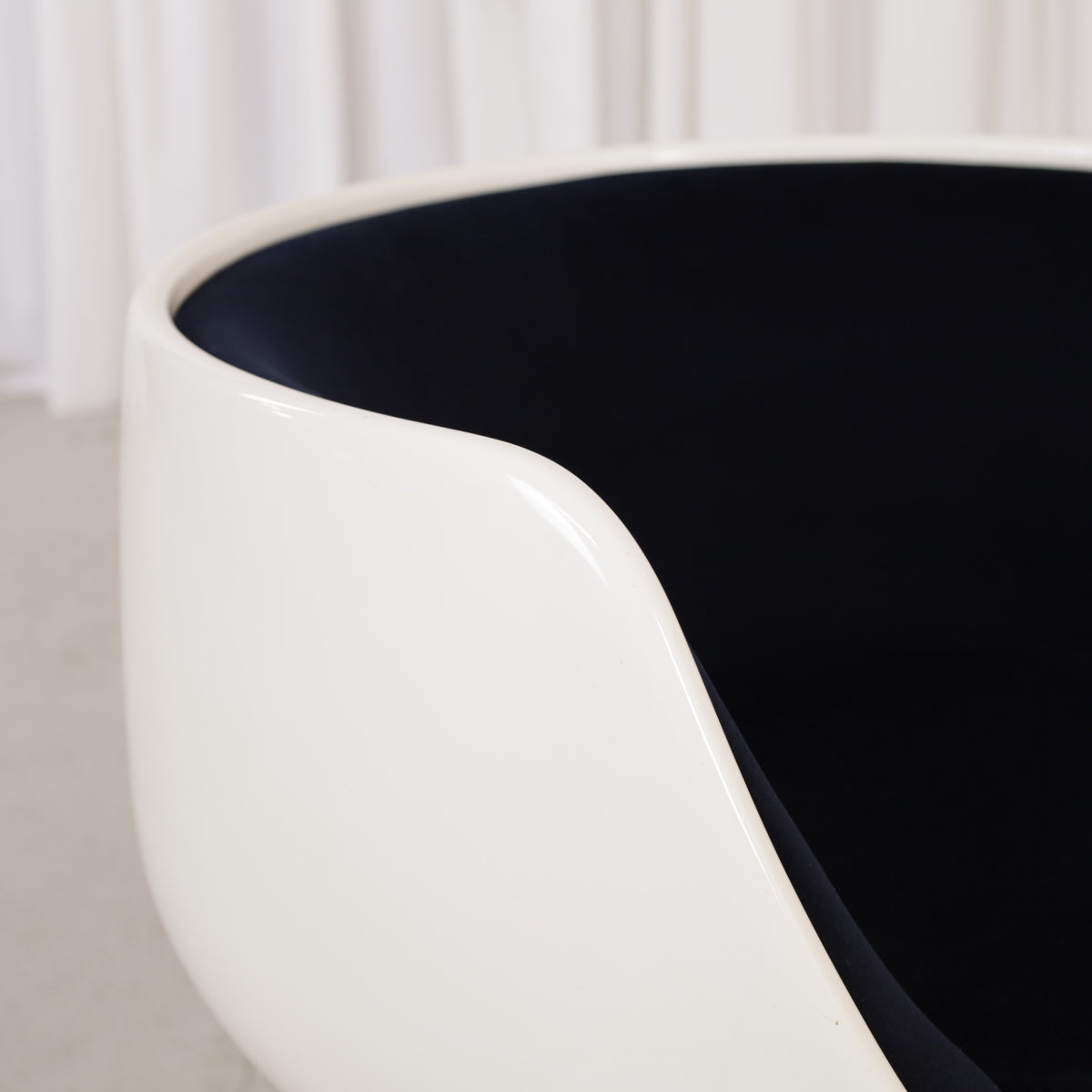 Eero Aarnio Cognac chair for Asko with new black velvet upholstery, chair and upholstery detail