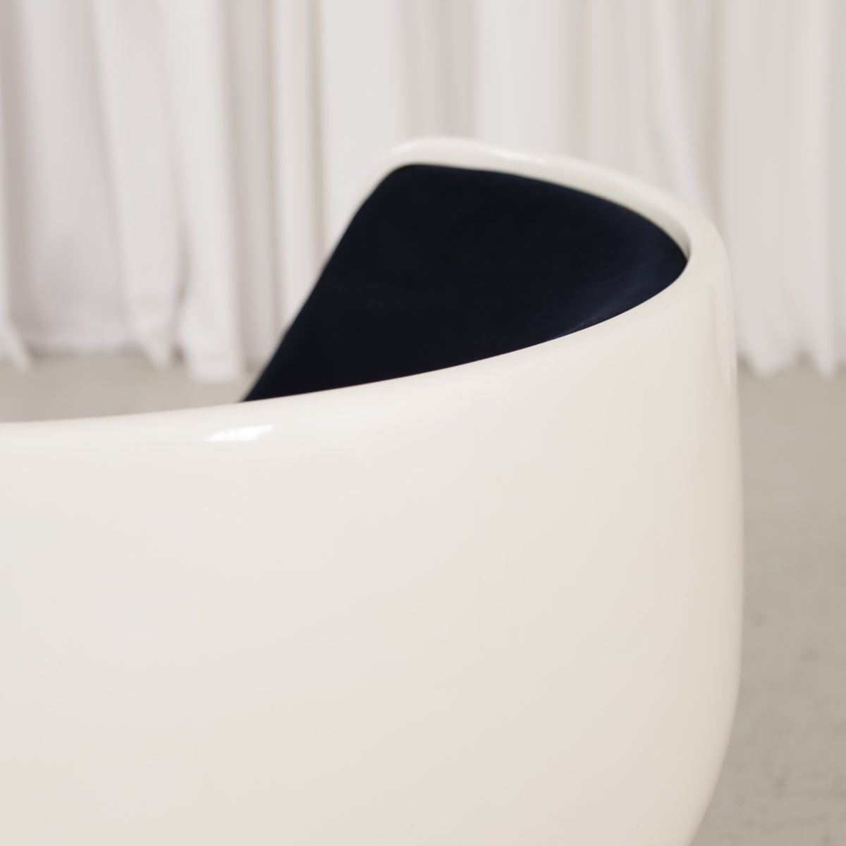 Eero Aarnio Cognac chair for Asko with new black velvet upholstery, chair and upholstery detail