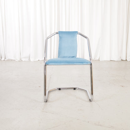 Italian-style chrome dining chair with blue upholstery — condition and details