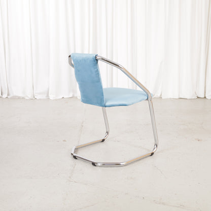 Italian-style chrome dining chair with blue upholstery — condition and details