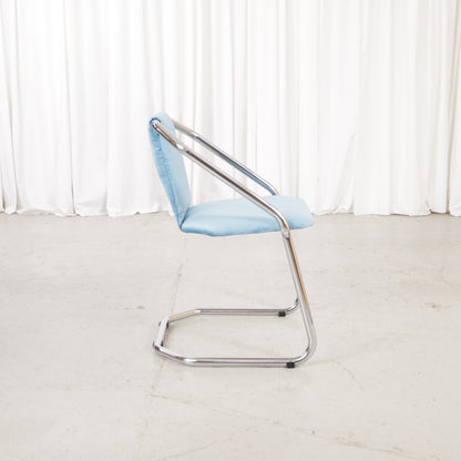 Italian-style chrome dining chair with blue upholstery — condition and details
